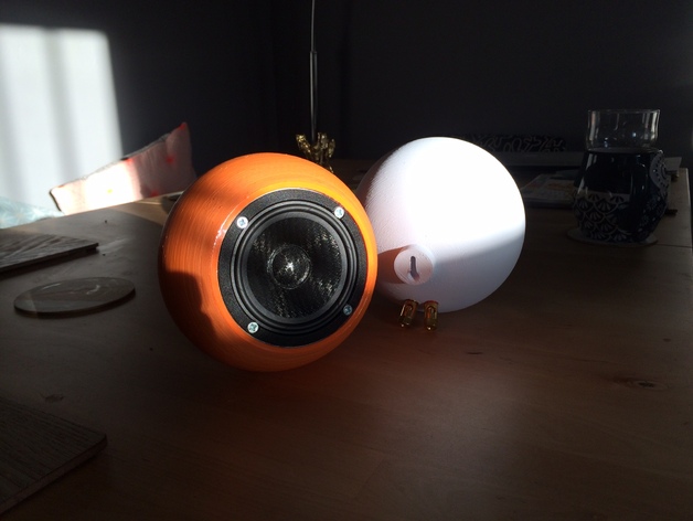 Spherical speaker with integrated wall mount