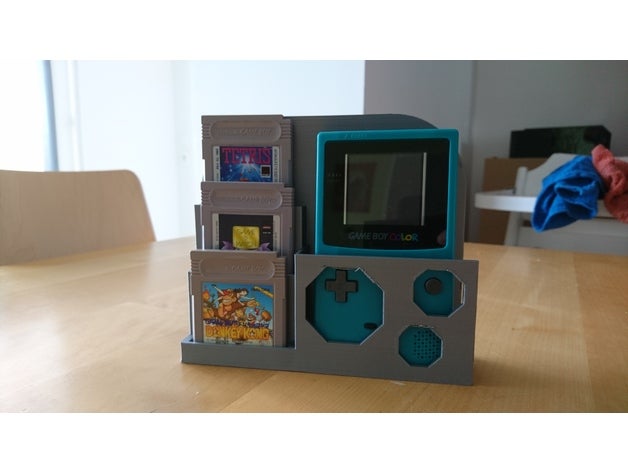 Gameboy console and games stand 