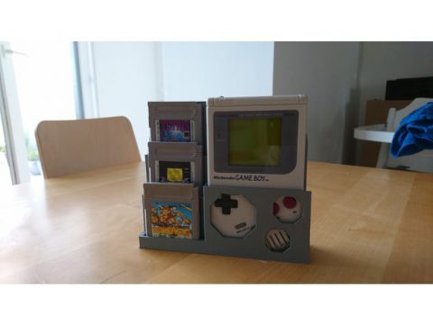 Gameboy console and games stand