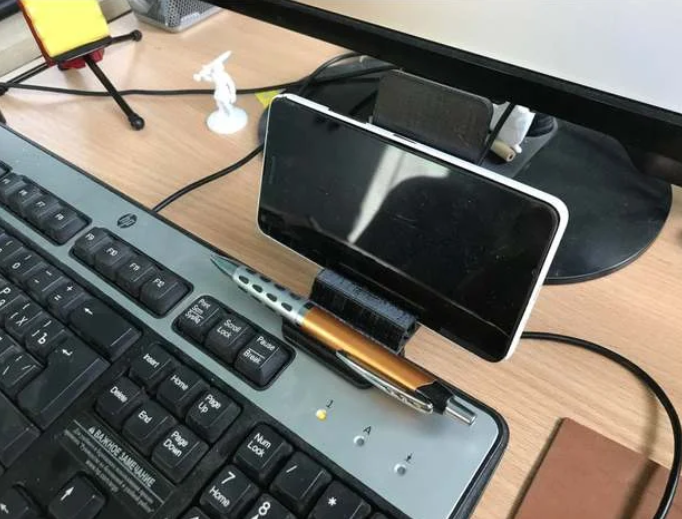 Phone stand for keyboard