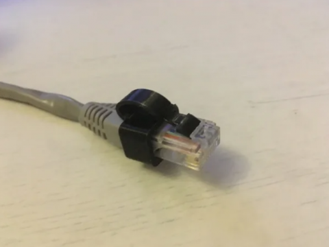 RJ45 replacement clip in two parts