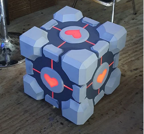 Life-sized Companion Cube pieces