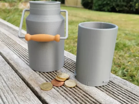 Very simple piggy bank in the shape of a milk can