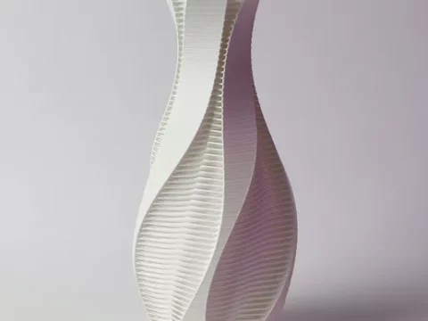 Twisted vase with strands