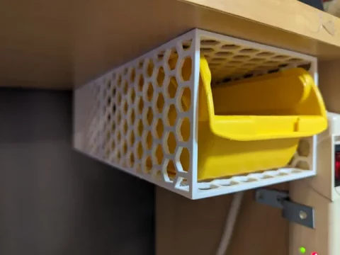 Ceiling mountable holder for small storage bin