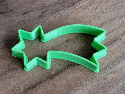 Cookie cutter in the shape of a Christmas comet