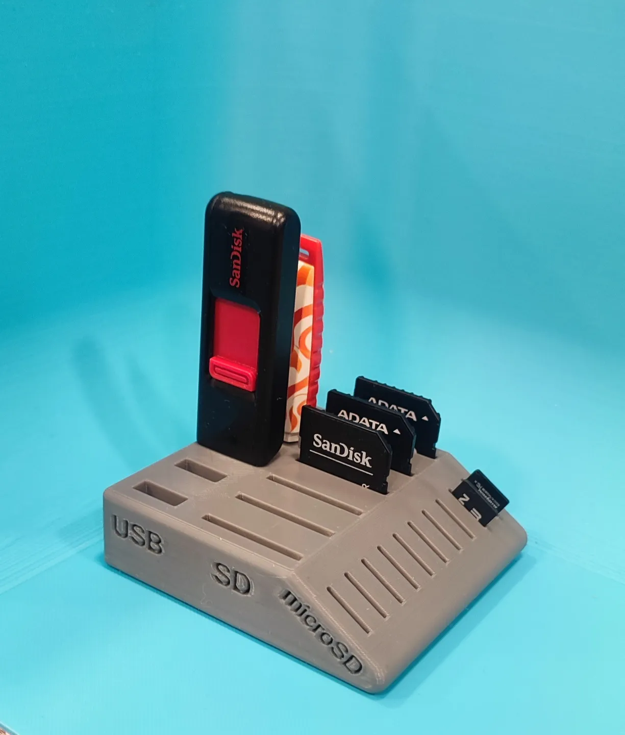SD, microSD, and USB drive holder 3d model